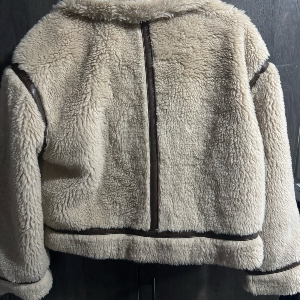 American Eagle Outfitters white label on brown trim